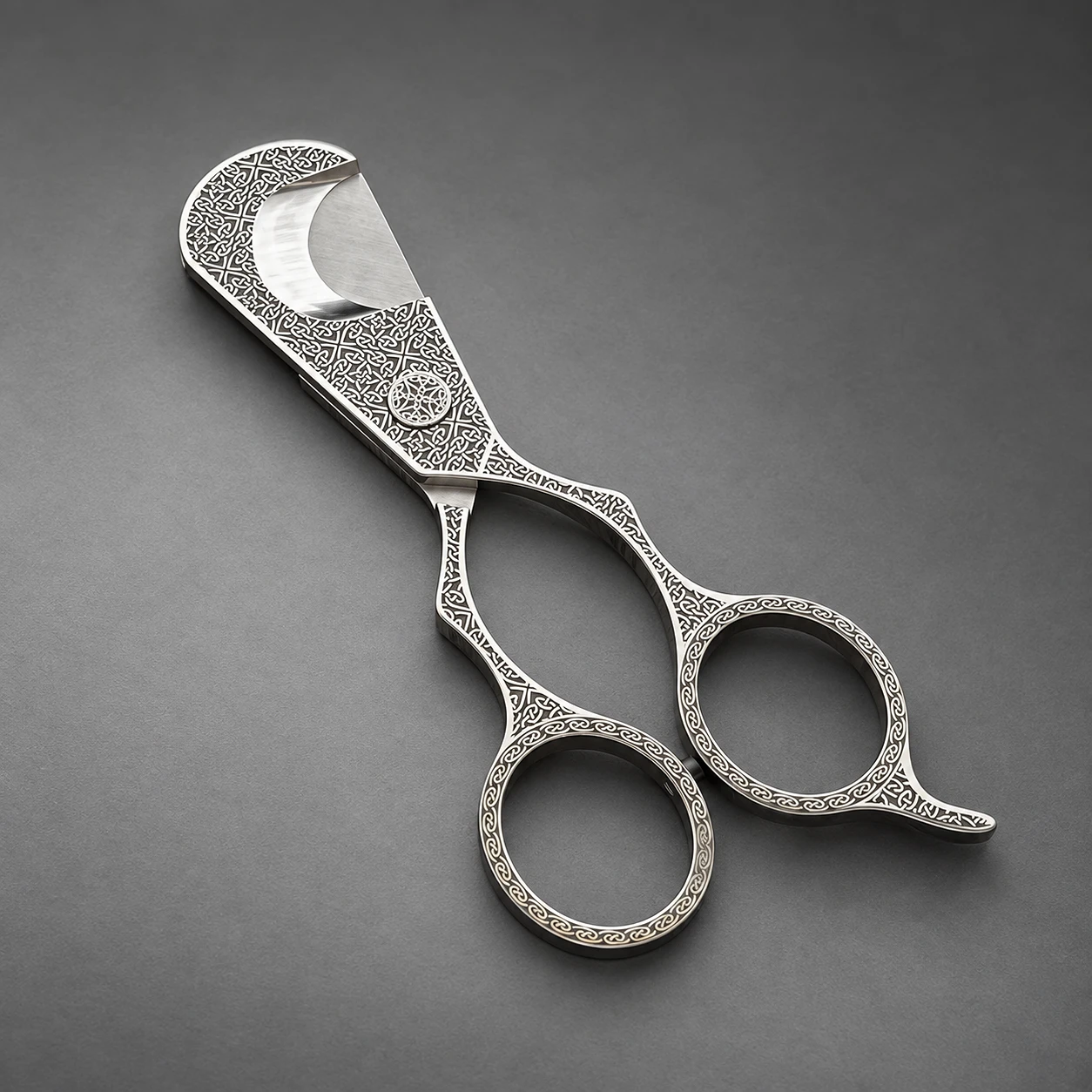 Celtic Knot cigar scissors – full length view, intricate laser-engraved Celtic pattern across the steel body