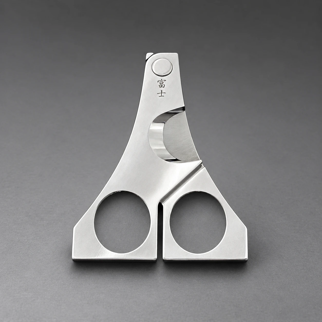 FUJI cigar scissors – closed, front view showing the mountain-inspired triangular form with 富士 Kanji engraving