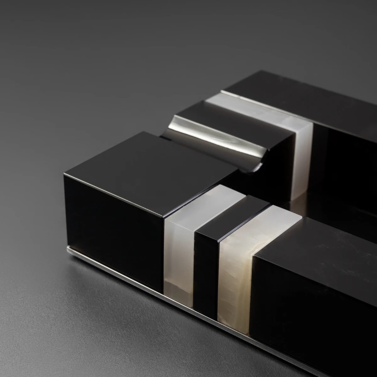 Black & White ashtray — side profile, stone contrast