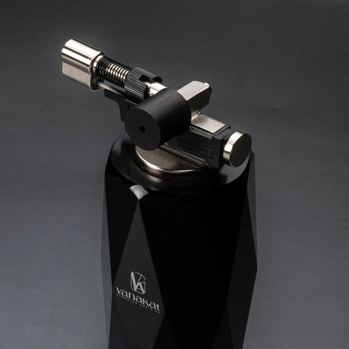 Bristol Lighter — side profile, faceted volcanic stone lighter