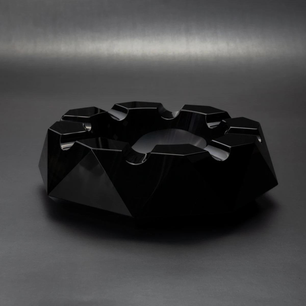 Bristol ashtray — angled view, faceted volcanic stone panels