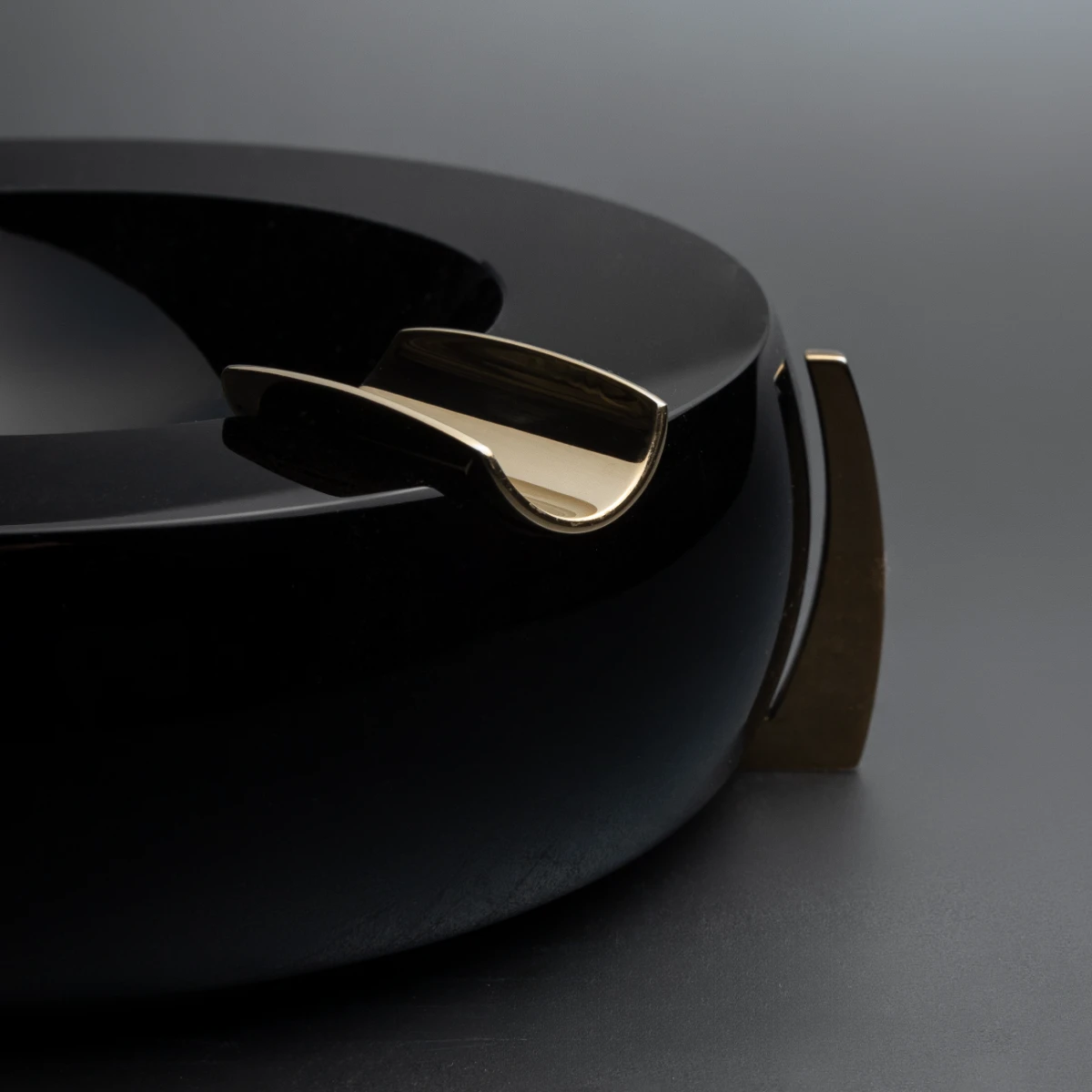 Dragon Ospreys ashtray — deep concave bowl, gold legs detail