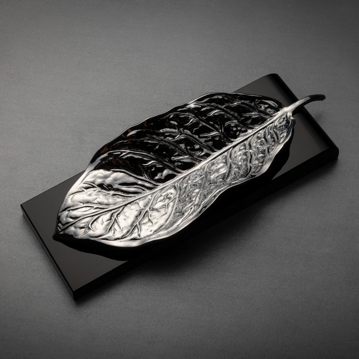 Habano Silver obsidian ashtray — hand-cast brass tobacco leaf on Jet Black obsidian