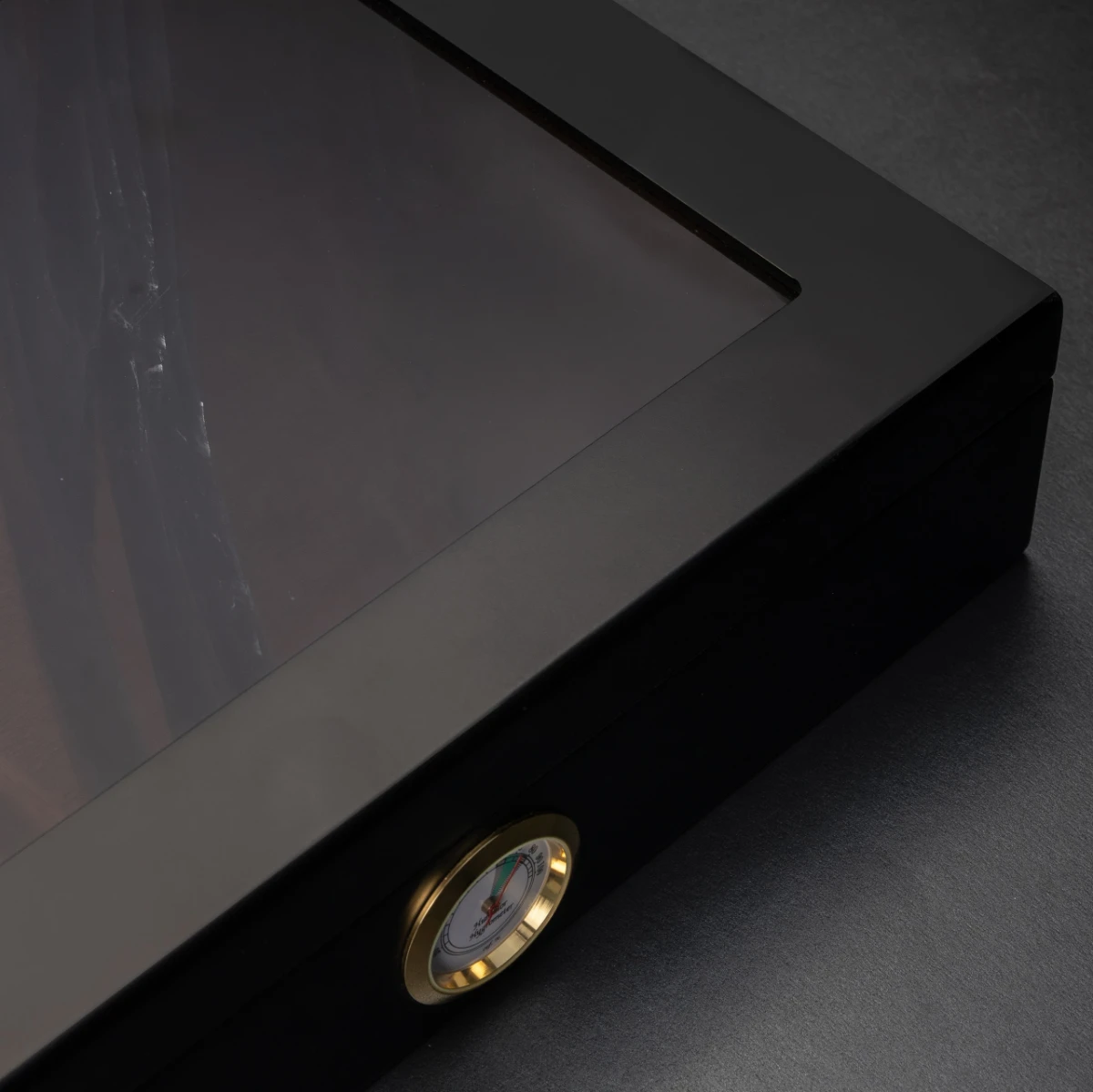 Humidor No. I — Spanish cedar interior, semi-translucent obsidian lid