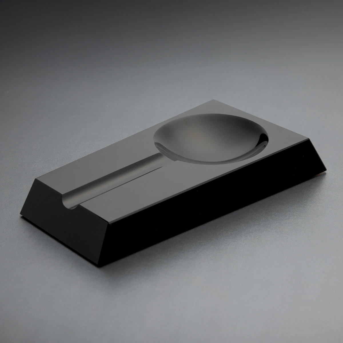 Loupe Jet Black obsidian cigar ashtray — mirror-polished single stone
