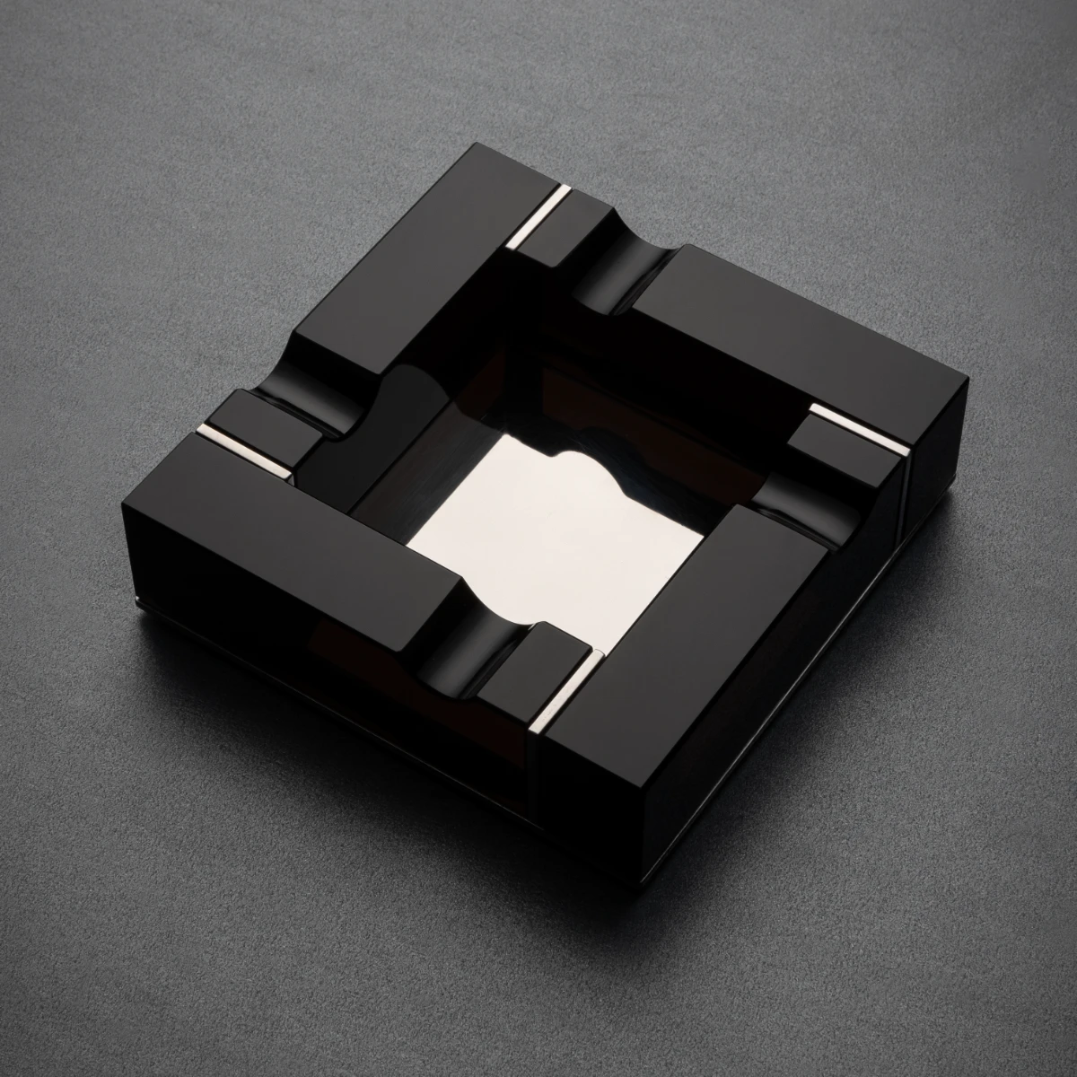 Noir geometric star obsidian cigar ashtray — nickel-plated steel base