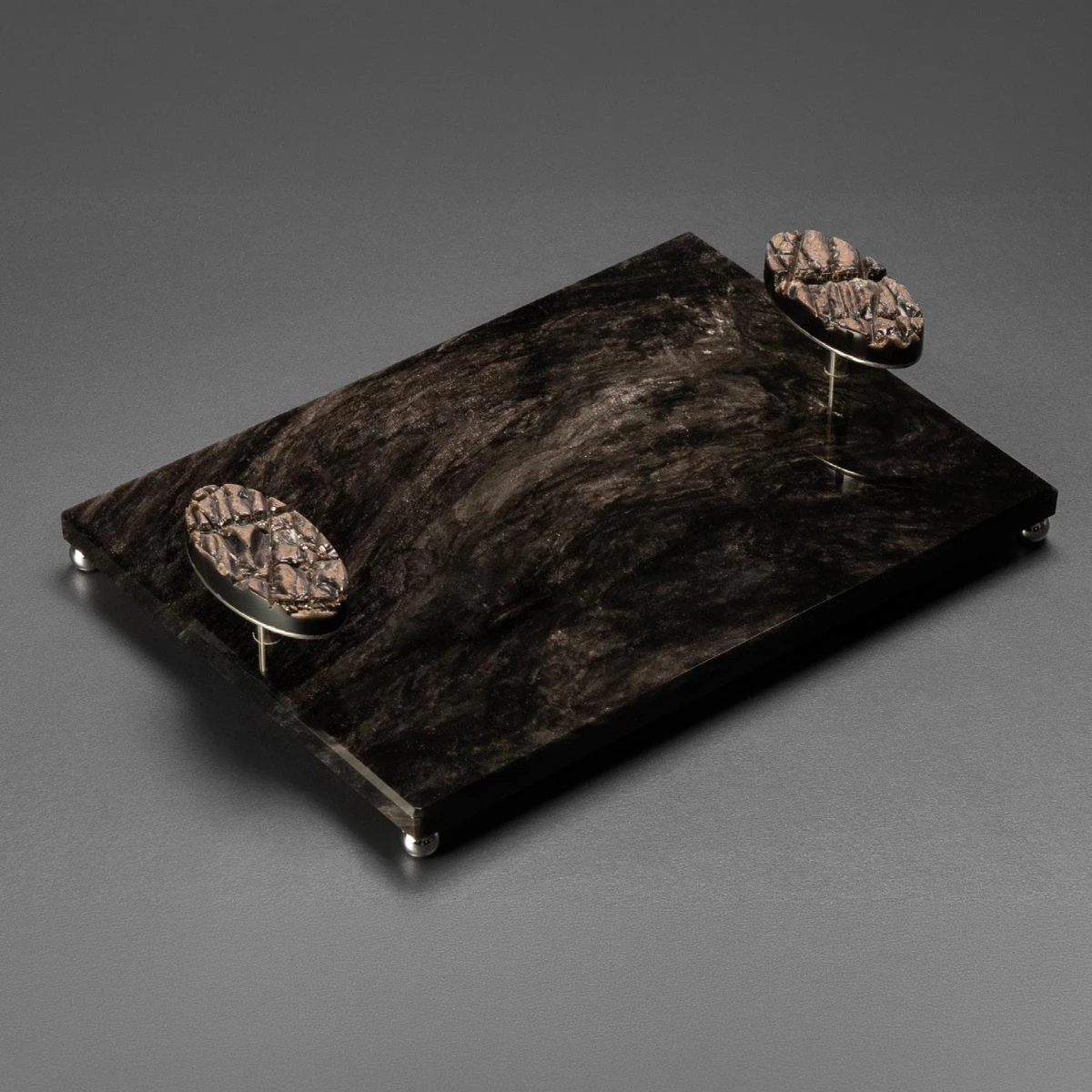 Obsidian service tray — hand-finished volcanic stone bespoke commission